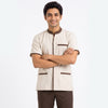 Ivory Housekeeping Uniform with Brown Tipping